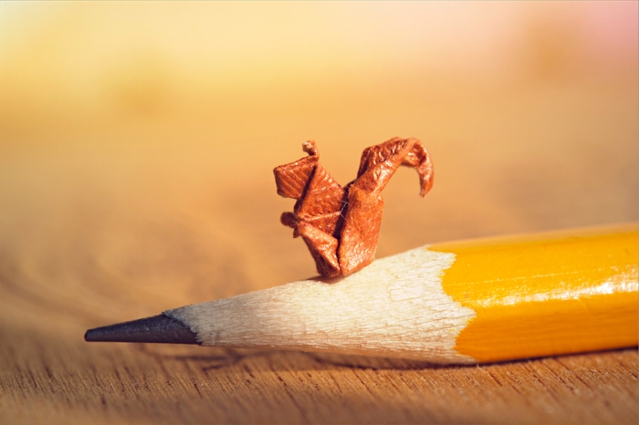 52 weeks of tinygami, miniature origami squirrel sitting on a pencil